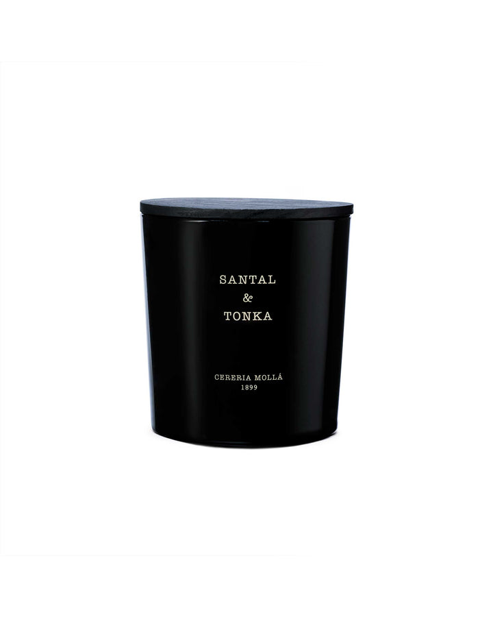 Très grande bougie parfumée à trois mèches Santal et Tonka en verre noir