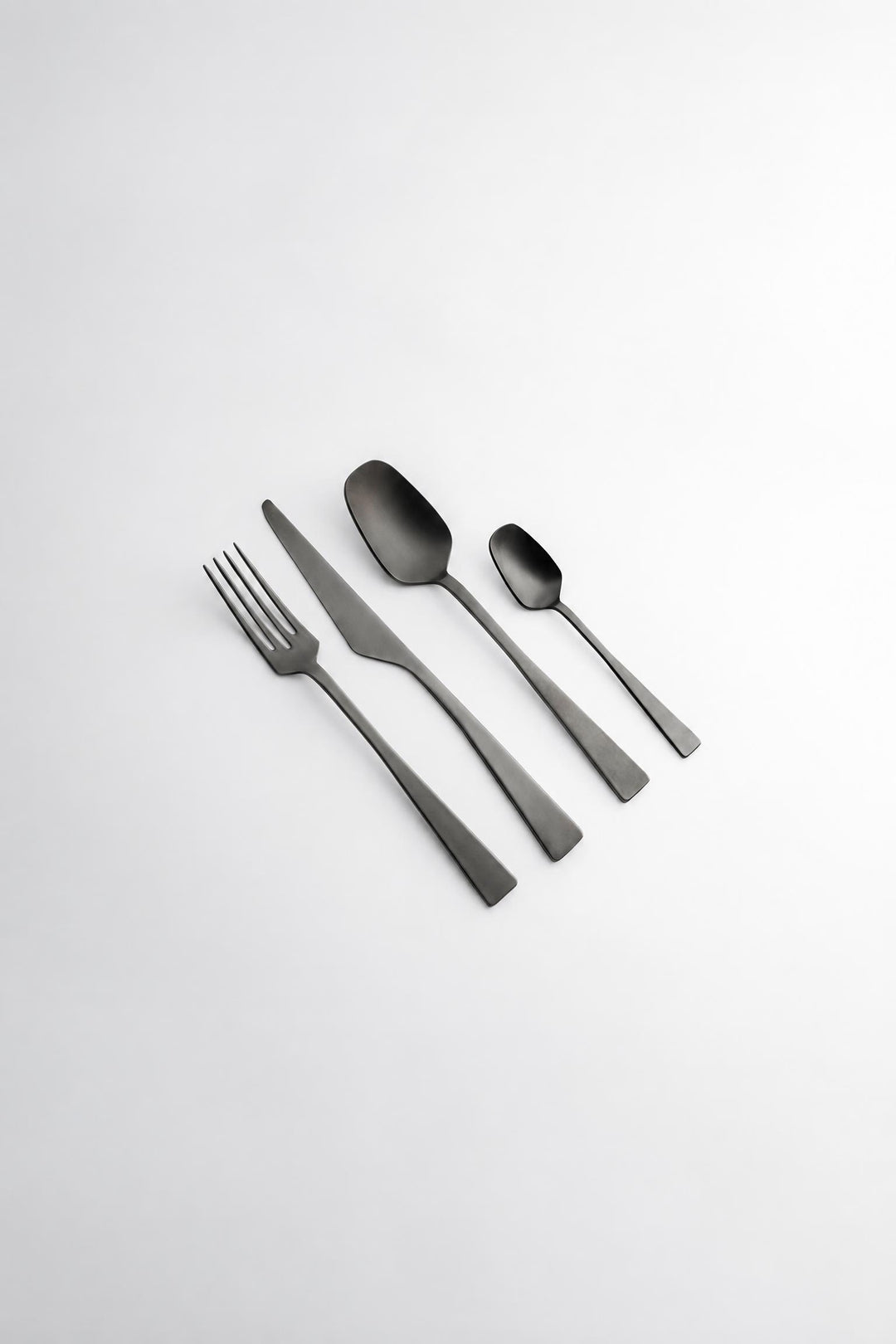 Set di posate 4 pezzi Zest in acciaio nella finitura ice black